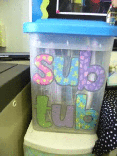 A plastic tub labelled "sub tub" as an example of tips for pre-K