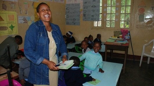 teacher-laughing-with-students teacher-laughing-with-students
