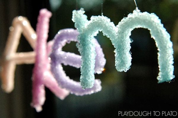 Crystalized pipe cleaner letters A, k, e, and m