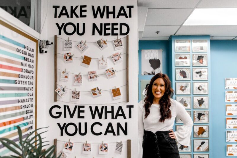 Brit-Jeltema-standing-in-front-of-her-interactive-bulletin-board when teaching 4th grade