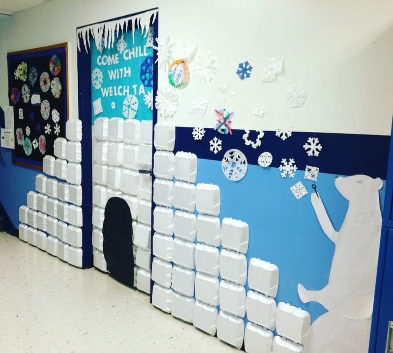 Classroom door decorated to look like an igloo using foam takeout containers