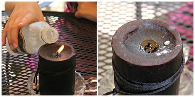 Student's hand holding a bottle next to a lit candle, then showing the candle blown out