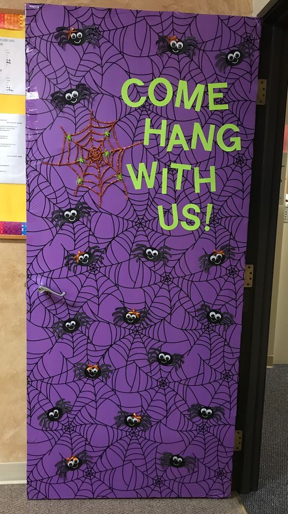 October bulletin board ideas can include doors like this one with a purple background and bats hanging off of it. Text reads, 