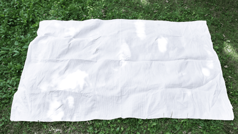 Photo of a blanket on the grass
