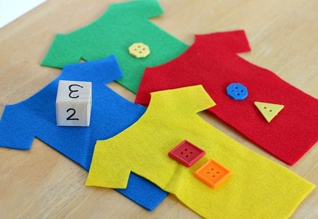 Buttons on felt with dice