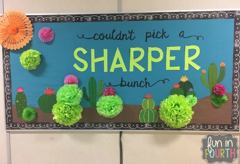 Bulletin board showing cactus made from tissue paper and paper cutouts. Text reads 