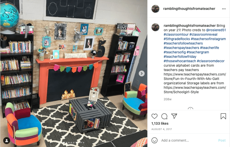 classroom library with a fake fireplace, cozy rug, and colorful shelves of books