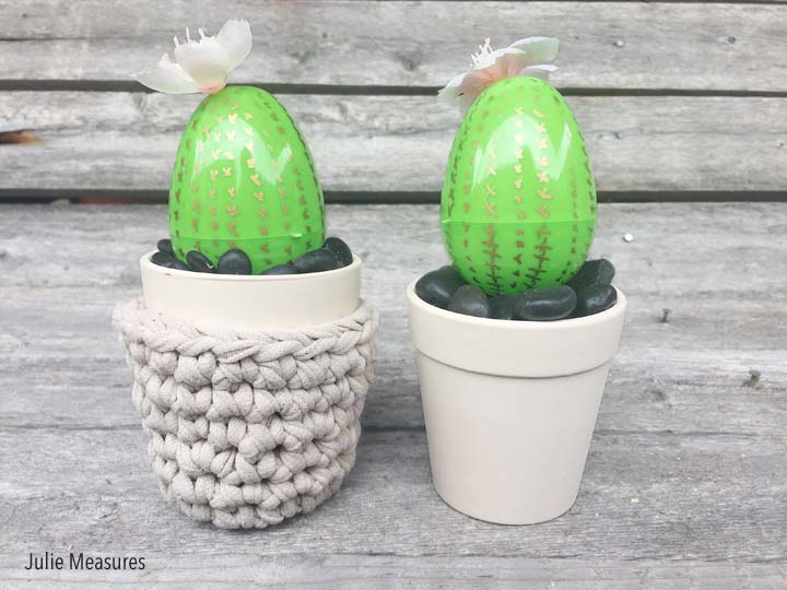 Green plastic eggs painted to look like cactus, placed in plastic pots (Easter Egg Activities)