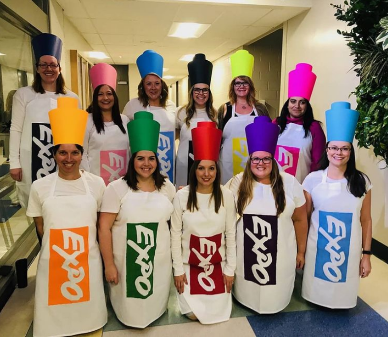 Halloween Expo Markers Teacher Costume; a large group shot shows women all dressed as different colored markers.