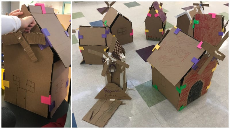 Houses built from pieces of cardboard in a classroom -- teaching STEAM