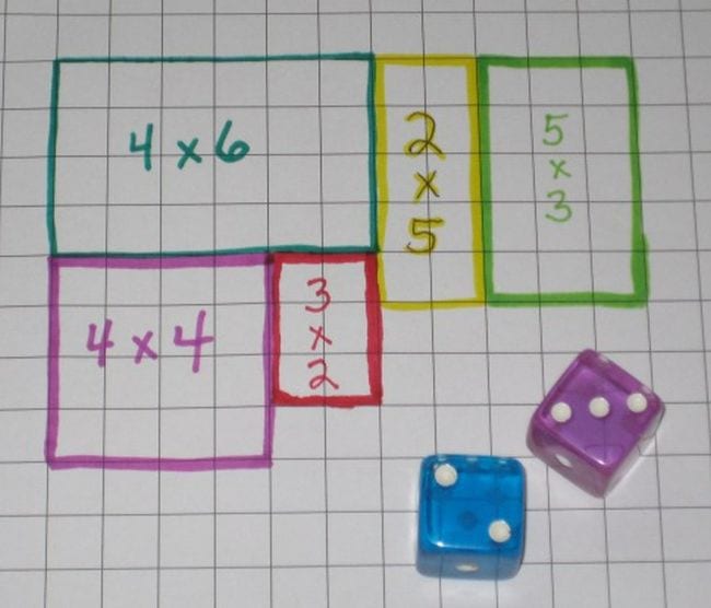 graph paper with different squares and rectangles drawn in different colors. each shape has dimensions written inside.