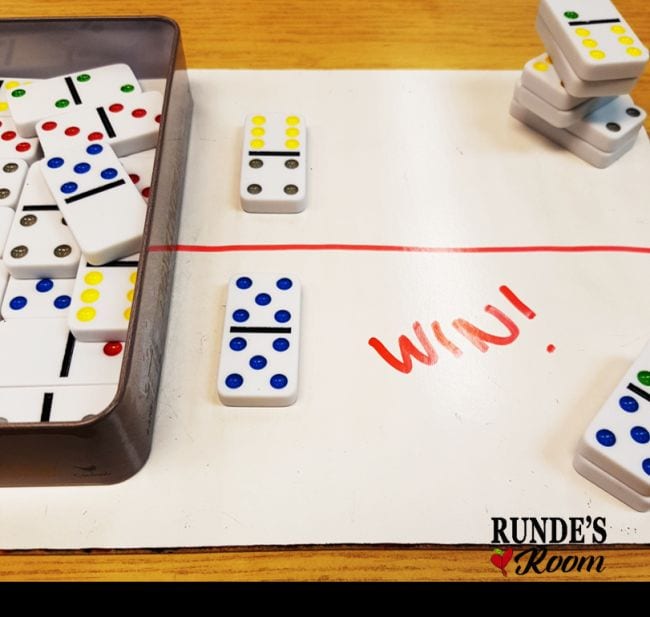 Fraction War game played with colorful dominoes