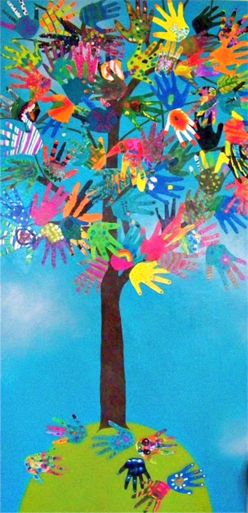 art auction ideas- a colorful tree painting with kid hand prints as leaves 