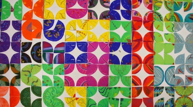 Colorful paper quilt squares made with circle designs (Kindergarten Art)