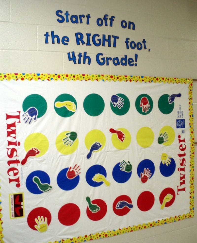 Twister board turned into a bulletin board, with kids names on handprints and footprints. Text reads Start off on the RIGHT foot, 4th grade!