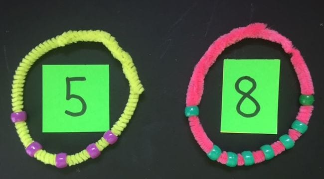Pipe cleaner bracelets with beads representing numbers