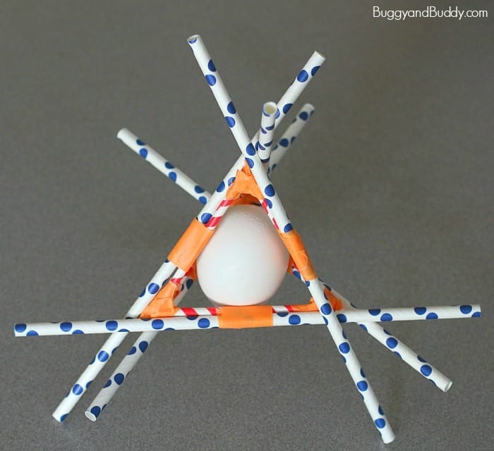 Egg surrounded by paper straws taped together in a pyramid shape (Outdoor Science)