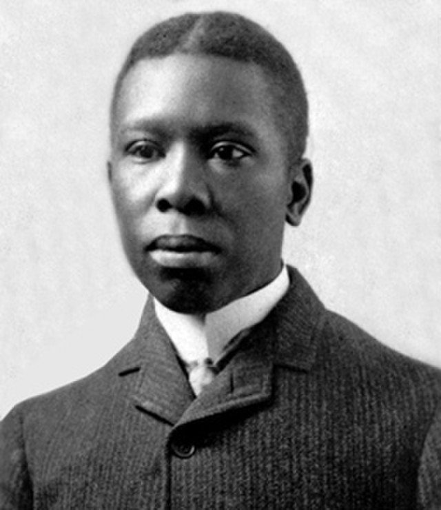 Black and white headshot of Paul Laurence Dunbar, as an example of famous poets kids should know.