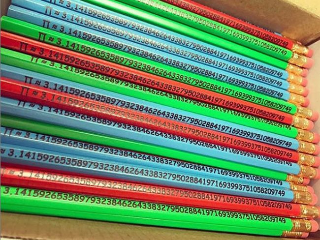 Collection of blue, green and red pencils with the digits of pi printed on them
