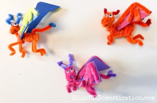 Pipe cleaner craft of colorful dragons