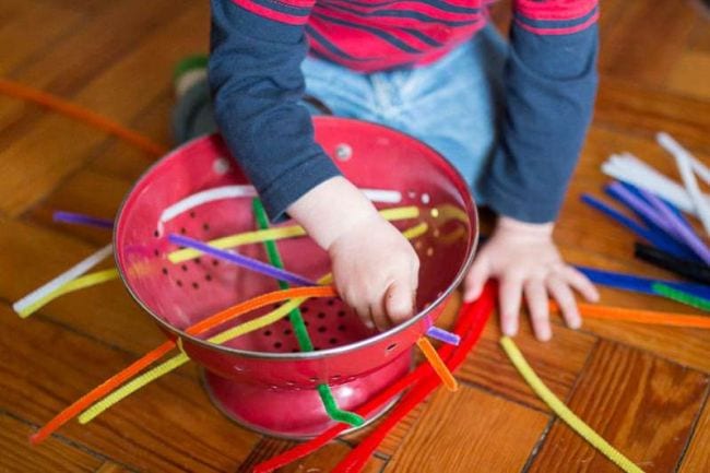 Colander with pipe cleaner stuck through it- pipe cleaner crafts