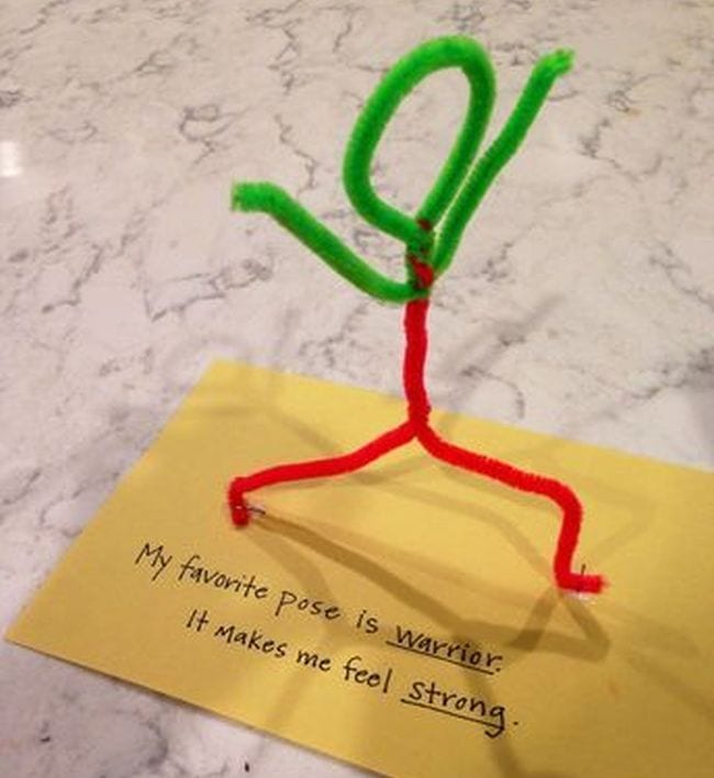 Pipe cleaner figure doing a yoga pose