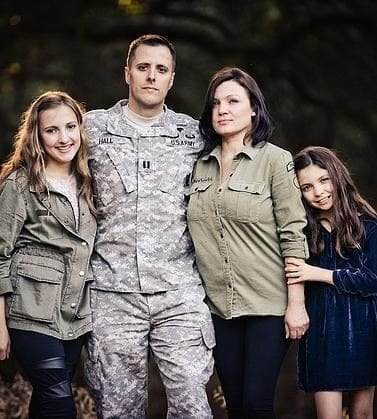 Kenzie Hall founder of Brat Pack 11 with father in military uniform, mother, and younger sister