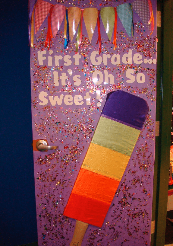 Door decoration of a popsicle and the words "first grade... it's oh so sweet!" -- classroom doors