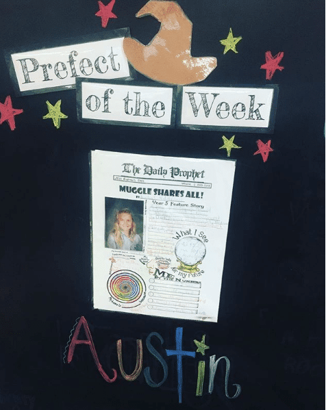 Prefect of the Week board with newspaper pinned