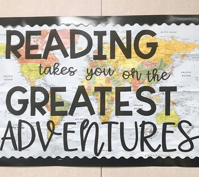 Bulletin board showing a map with text "Reading takes you on the Greatest Adventures" (Back-To-School Bulletin Board Ideas)