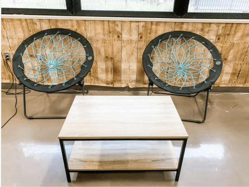 Two bungee cord chairs in a classroom