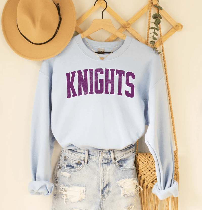 Sweatshirt with word "Knights" on it