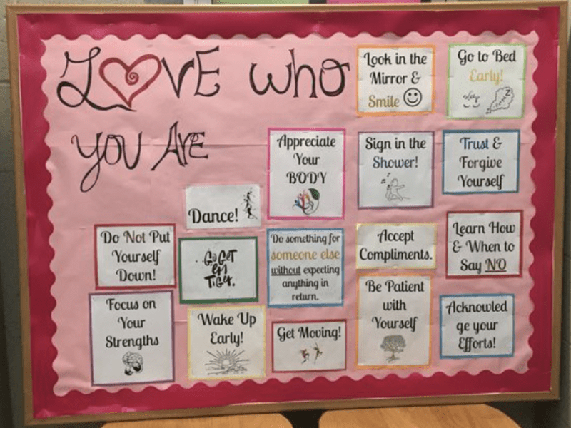 Bulletin board with words Love who you are