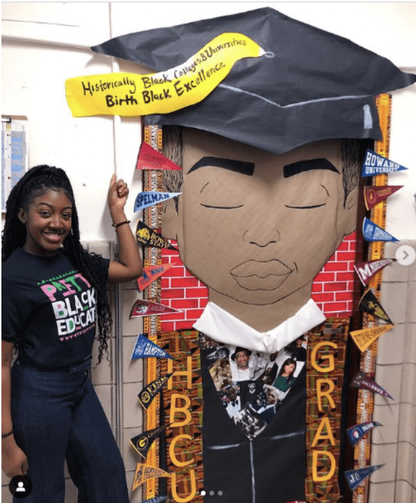 Door showing a drawing of Black student wearing graduate cap and gown