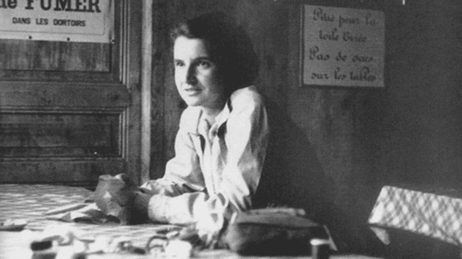 Rosalind Franklin smiling, as an example of famous scientists
