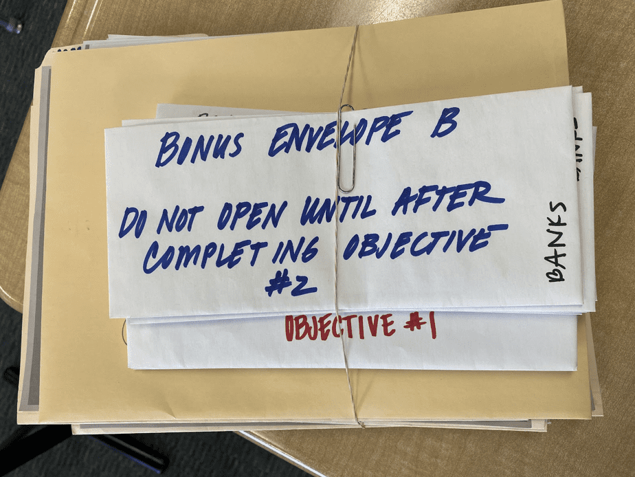 Envelope with words Do not open until after completing objective #2