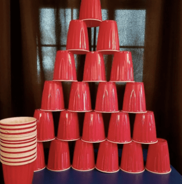 Red solo cups stacked in a pyramid 