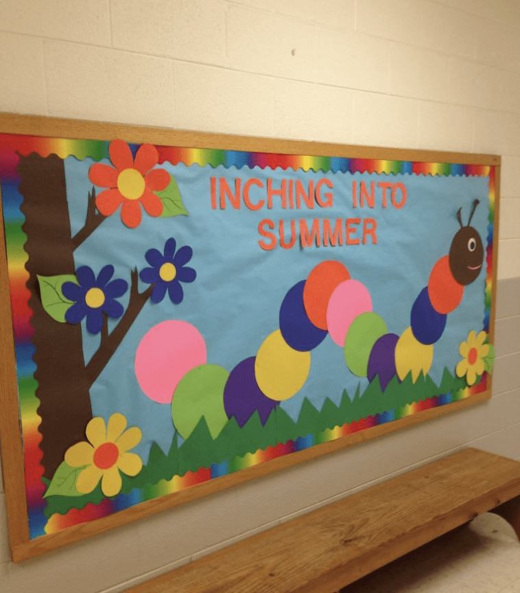 Bulletin board with words Inching into Summer