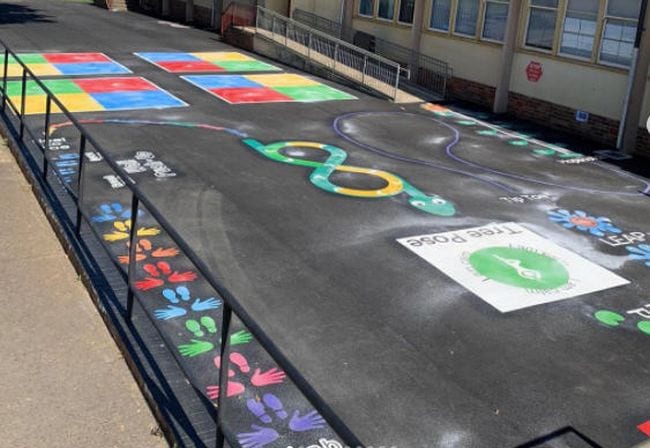 Playground sensory path with bear crawl and yoga tree pose spot