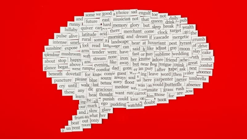 word bubble made up of sight word magnets against a bright red background