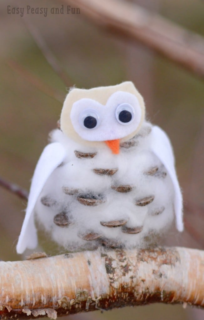 Fluffy white owl craft made from pinecone