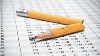 Broken pencil on standardized test answer sheet - Testing in Schools