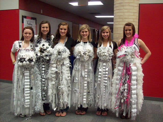 Studens wearing giant mums