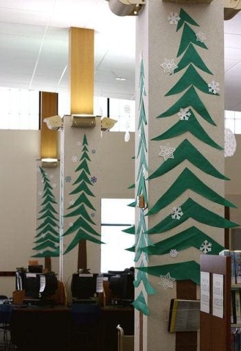 Classroom pillars decorated with cutout tree decorations