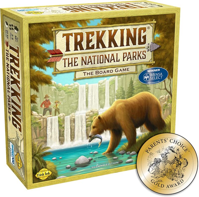 A game box says Trekking the National Parks and features a bear crossing a river. 