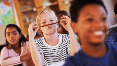 Trauma-Informed Classroom: Student misbehaving with a pencil in classroom
