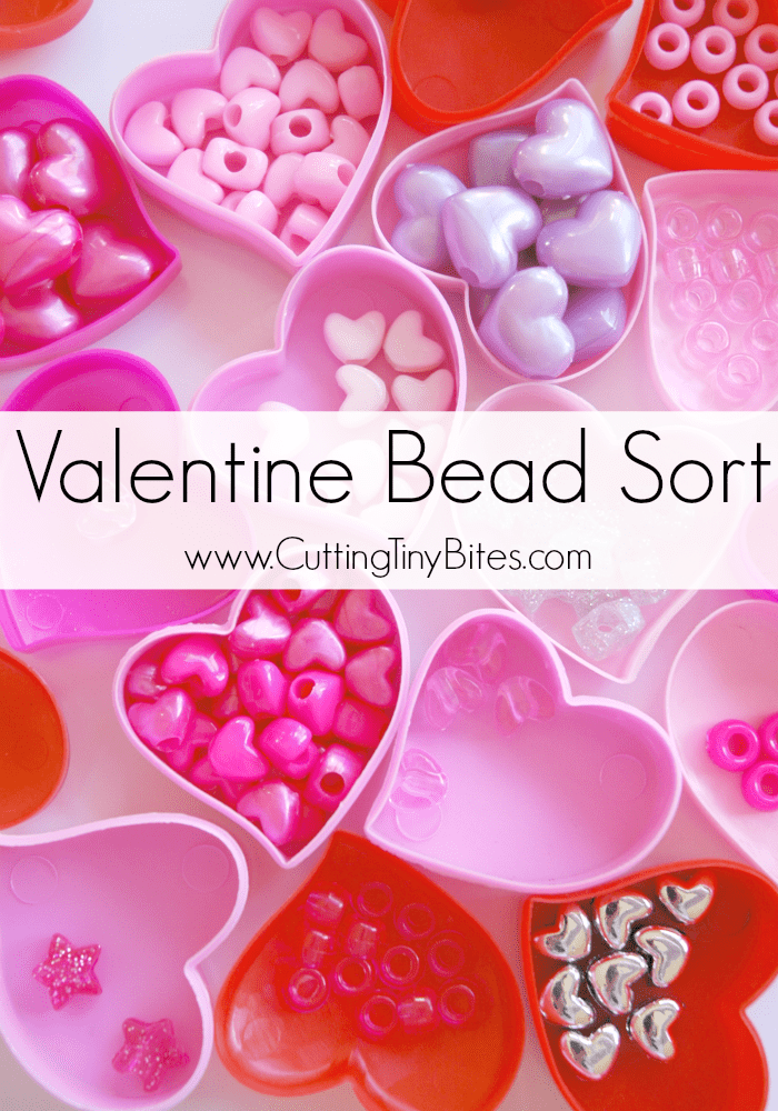 Heart shaped containers are shown with different heart shaped beads sorted into them.