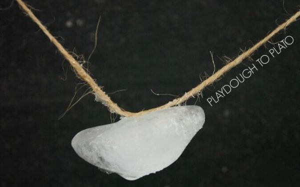 Piece of string with an ice cube stick to it (Winter Science Experiments)