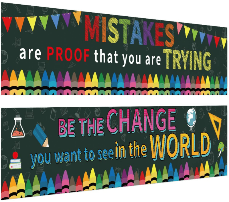 Two large classroom banners decorated with colorful crayons. They read, "MISTAKES are PROOF that you are TRYING" and "BE THE CHANGE you want to see in the WORLD."