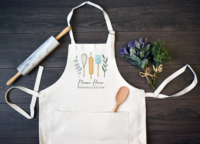 A linen apron has space on it for personalization.